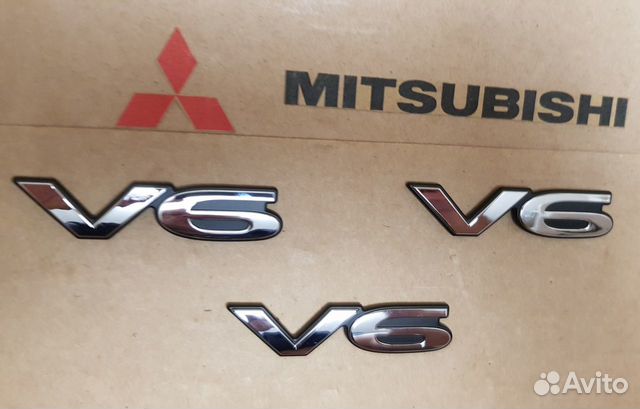 MB814468 Mitsubishi V6 эмблема mb814468 MB814468 Mitsubishi V6 эмблема mb814468