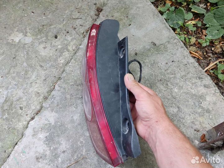 Nissan march k12 задняя левая фара