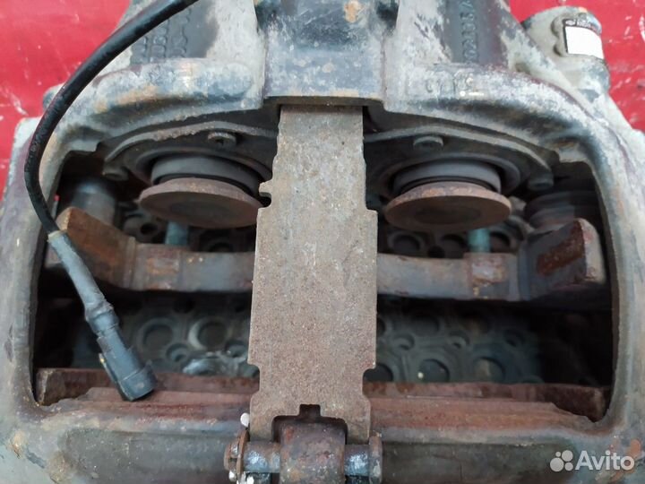 Суппорт задний левый