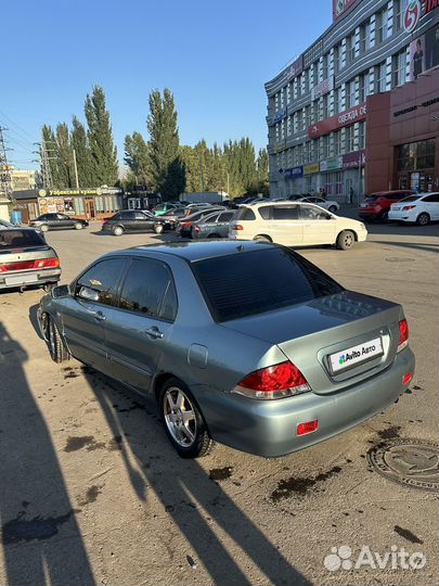 Mitsubishi Lancer 1.6 МТ, 2006, 99 999 км