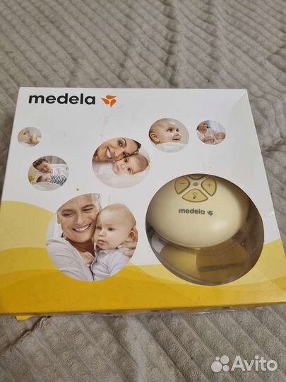 Молокоотсос medela электрический