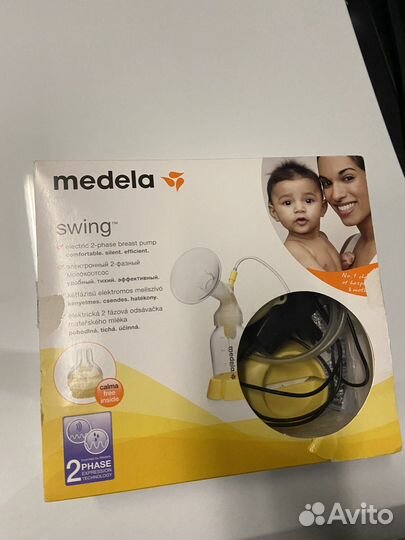 Молокоотсос medela электрический