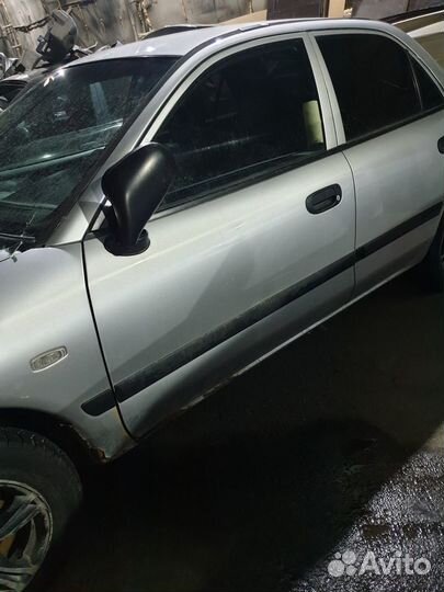 Дверь передняя Mitsubishi Carisma