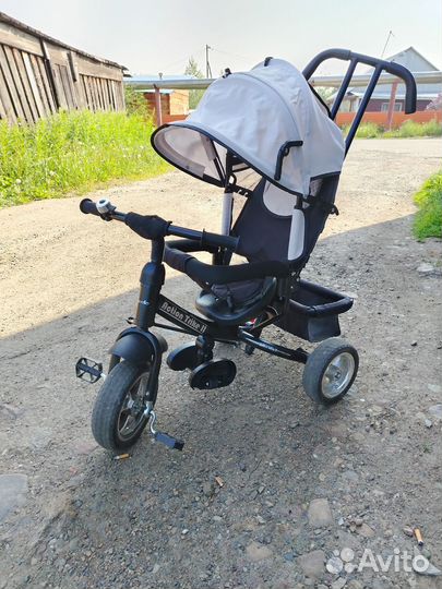 Детский трехколесный велосипед с ручкой