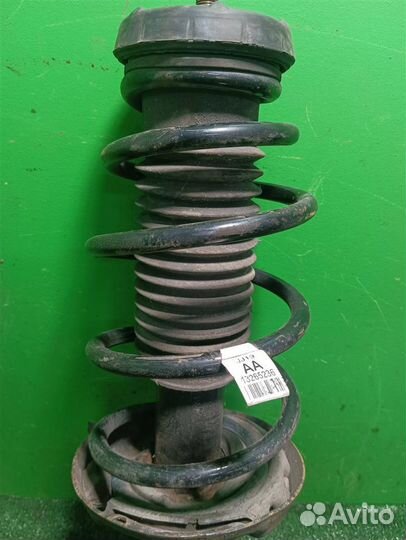 Стойка амортизатора передняя левая Chevrolet Cruz