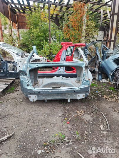 Задняя панель багажника Mitsubishi lancer 10 X