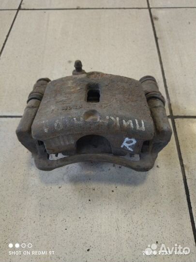 Суппорт тормозной правый Kia Picanto 1