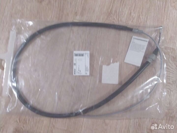 Трос ручного тормоза