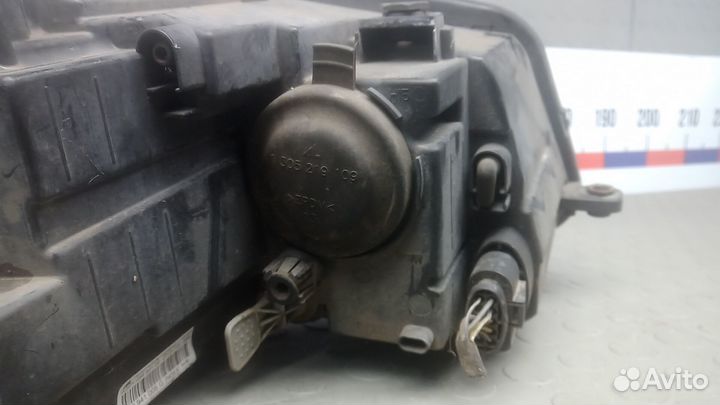 Фара левая Volkswagen Touran