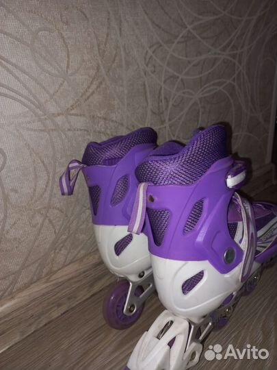 Роликовые коньки