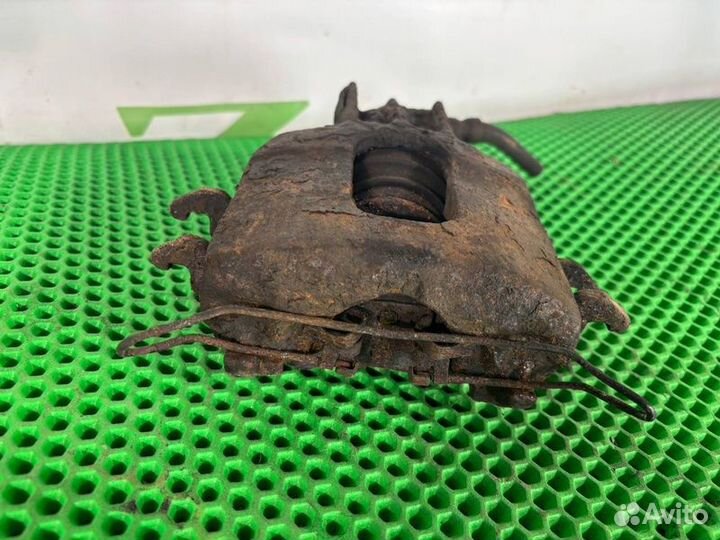 Суппорт тормозной передний левый Ford Focus 1 1.6