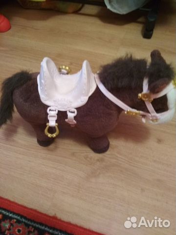 Детская игрушка лошадка