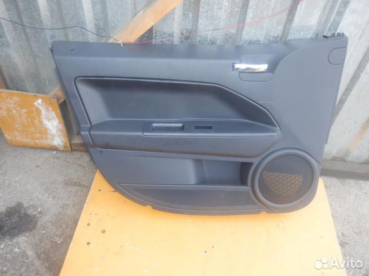 Обшивка двери лев.перед. Dodge/ Caliber/ PM20/ к.т