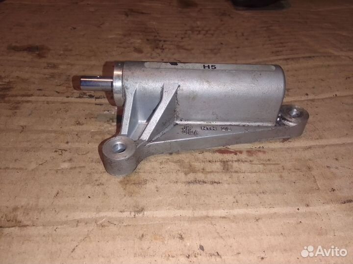 Натяжитель ремня грм 1.8 ARG Volkswagen Passat B5