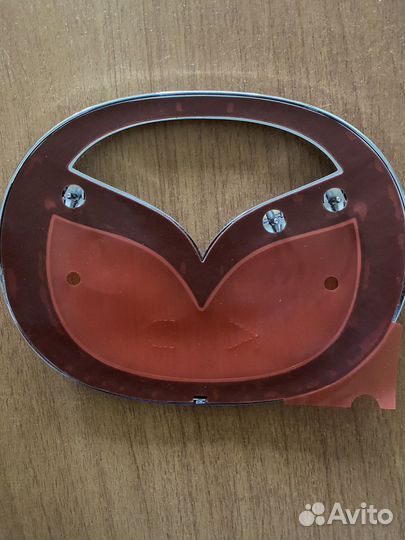 Эмблема Mazda