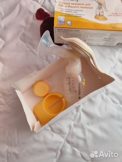 Молокоотсос medela ручной