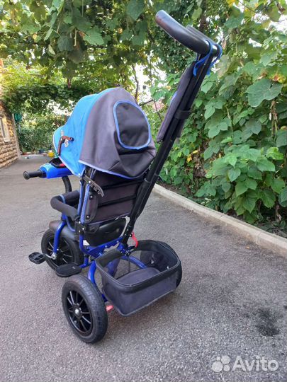 Трехколесный велосипед с ручкой