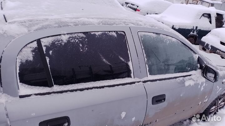 Стекло боковое правое левое Opel Astra G 5D