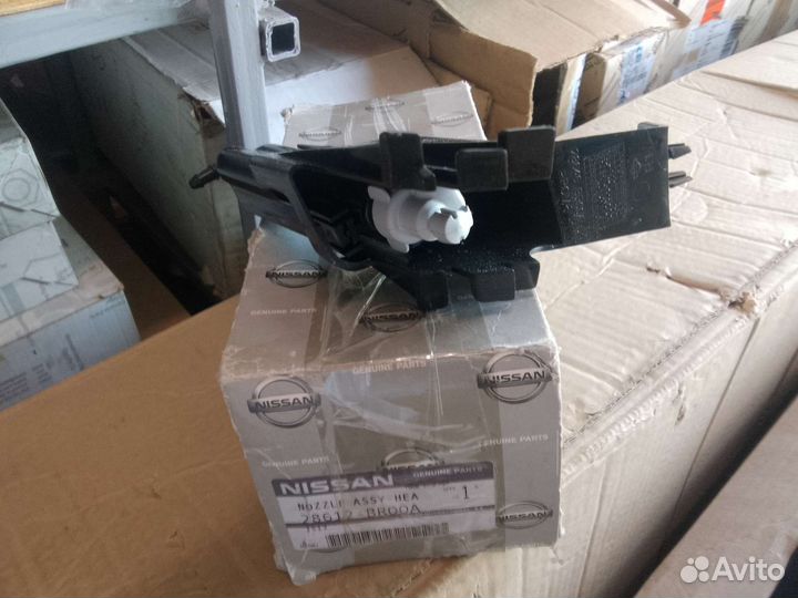 Форсунка омывателя левой фары qashqai