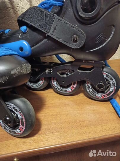 Роликовые коньки