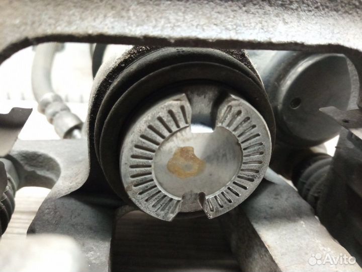 Суппорт тормозной задний левый Kia Sportage QL