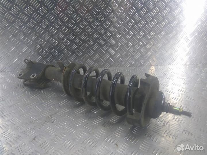 Стойка амортизатора передняя левая Опель Vivaro A