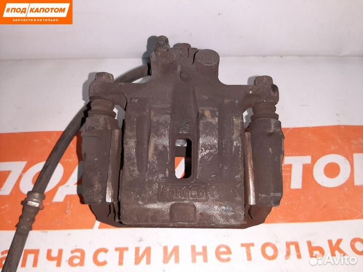 Суппорт тормозной задний левый Mazda CX-7 ER 2009