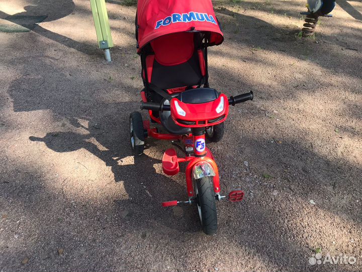 Трехколесный велосипед с ручкой