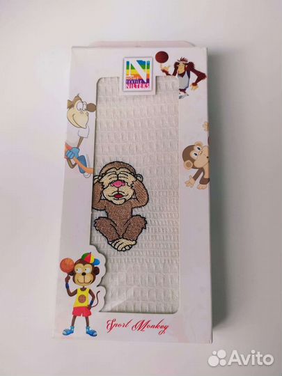 Новое кухонное полотенце в упаковке с обезьяной