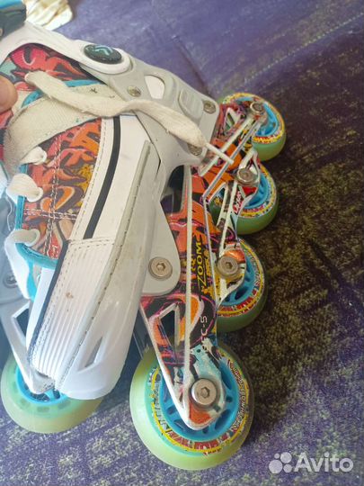 Роликовые коньки