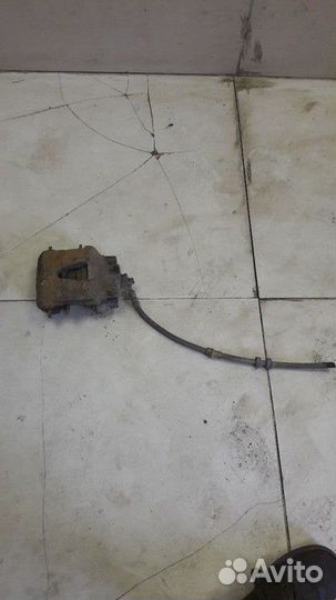 Суппорт тормозной передний левый Skoda Fabia