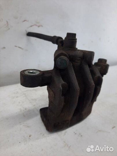 Суппорт тормозной задний левый Kia Rio хэтчбэк 5