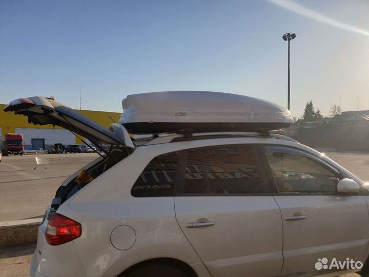 Бокс на крышу автомобиля