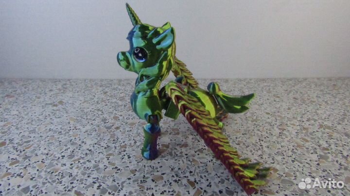 Единорог подвижная игрушка