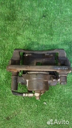 Суппорт тормозной передний правый Mazda Familia BJ