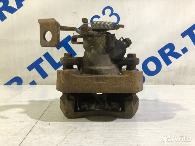 Суппорт задний левый toyota corolla E150 1.6 мт се