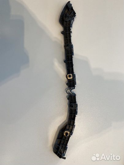 Крепление бампера, зад.лев. Toyota Corolla NZE 164