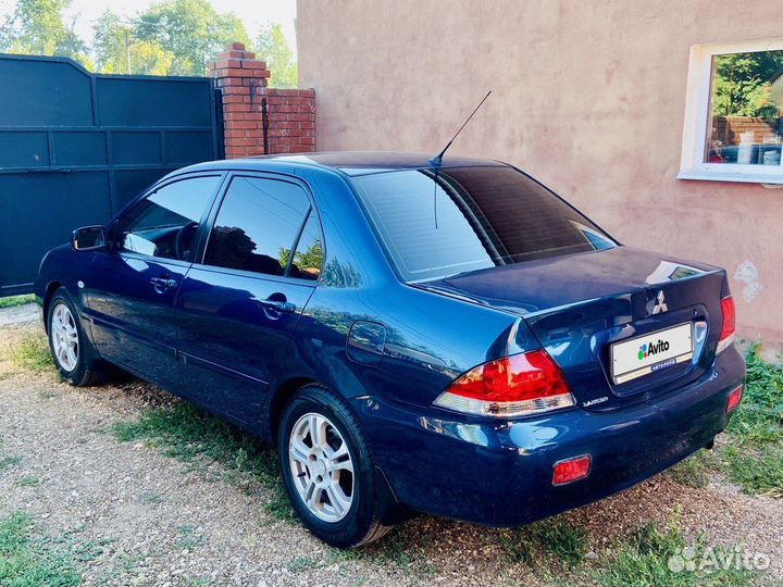 Mitsubishi Lancer 1.6 AT, 2009, 230 000 км