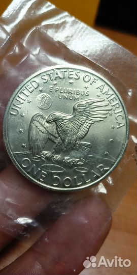 Монета один доллар