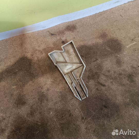 Кронштейн бампера левый Mitsubishi lancer 10