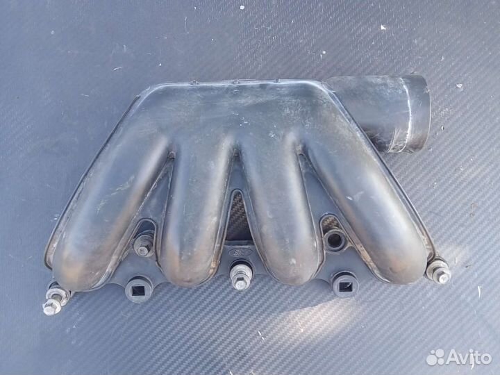 Впускной коллектор Ford Courier 1.8 D