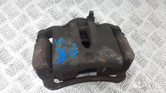 Суппорт тормозной передний левый KIA sportage 3 (H