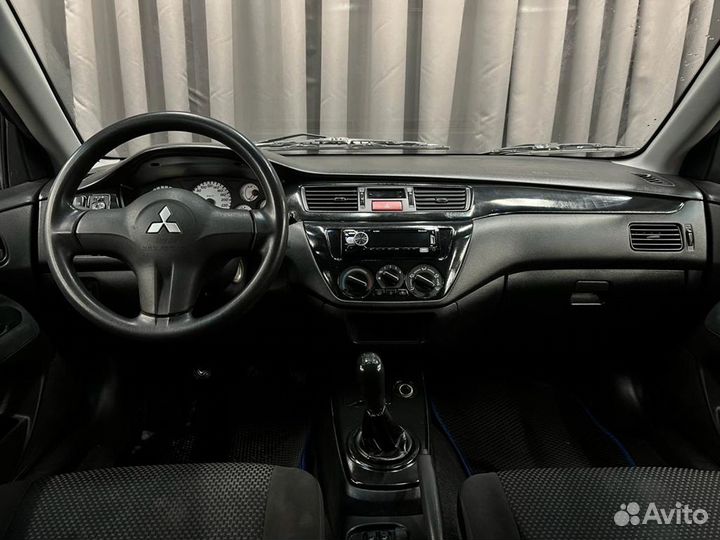 Mitsubishi Lancer 1.6 МТ, 2006, 165 333 км