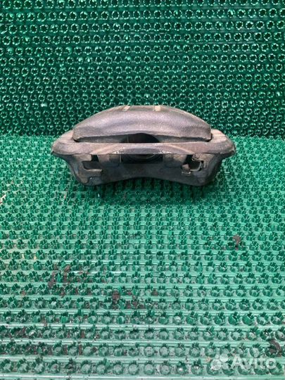 Суппорт тормозной передний левый Toyota Sprinter