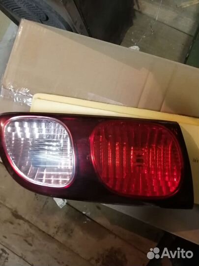 Фара Toyota Caldina левая задняя