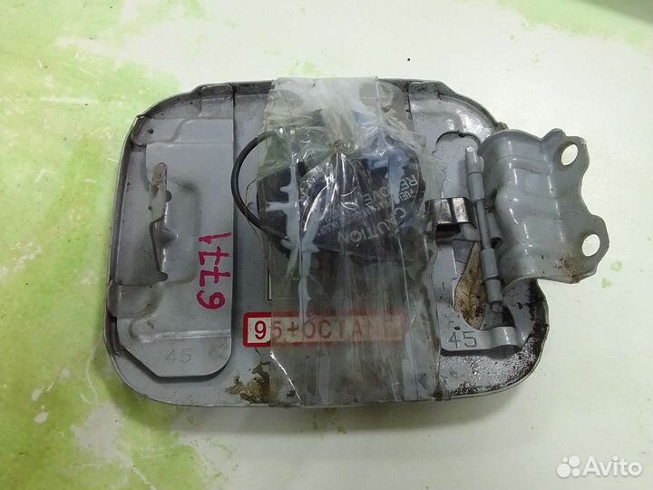 Лючок бензобака Mitsubishi Lancer IX