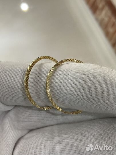 Золотые серьги конго