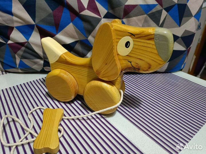 Развивающая игрушка каталка собачка