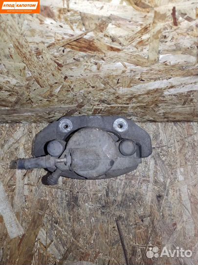 Суппорт тормозной передний правый Ford Fusion