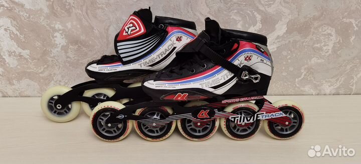 Роликовые коньки